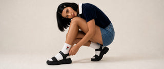 Woman wearing sandals and socks