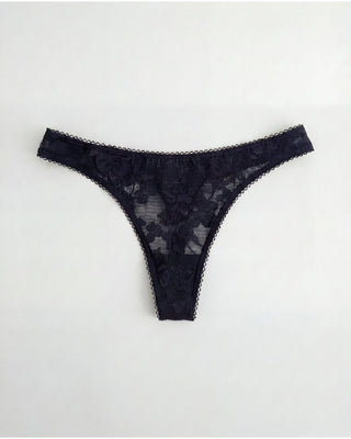 Black lace thong on a white background