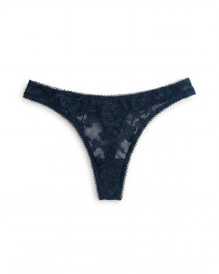 Navy blue lace thong on a white background