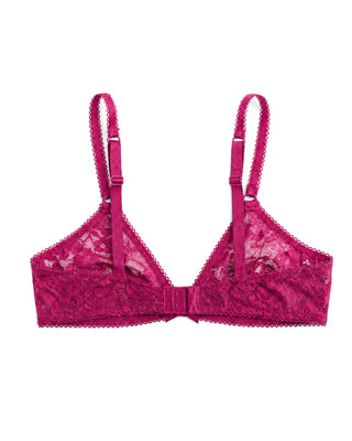 Pink lace bra on a white background