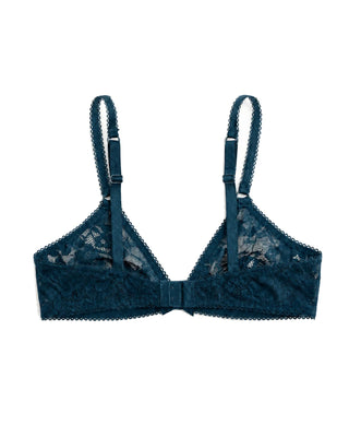 Blue lace bra on a white background